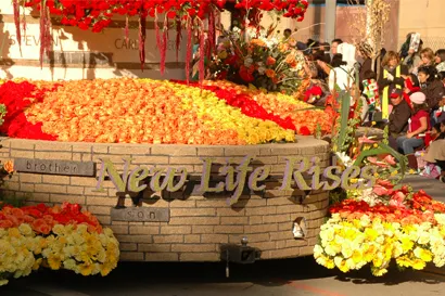new life rises rose float
